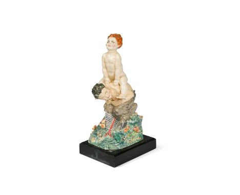 § Charles Vyse (1882-1971), Leap Frog, a polychrome glazed earthenware Chelsea pottery figure group, modelled as a young boy 