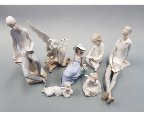 A collection of china figures, Lladro, Nao etc.