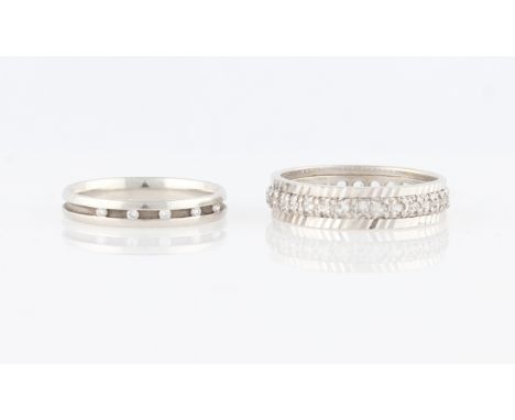 A hallmarked 9ct white gold cubic zirconia full eternity ring, ring size N, together with a hallmarked platinum diamond weddi