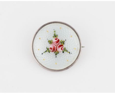 A Charles Horner silver enamel brooch, of circular design featuring floral pattern on white guilloche enamel background, hall