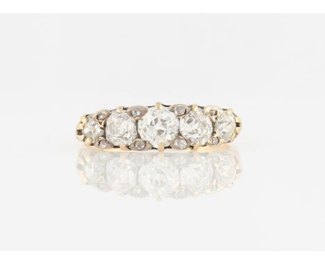 A five stone diamond ring, set with five graduated Old Mine cut diamonds, total diamond weight approx. 1ct, stamped 18ct, rin