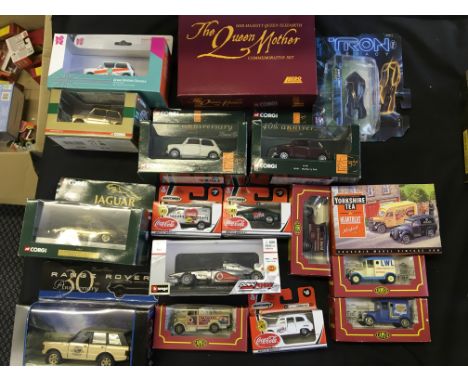 A collection of model vehicles including 2012 Mini Cooper, Lledo the Queen Mother Commeorative set, Corgi 50th Anniversary Au