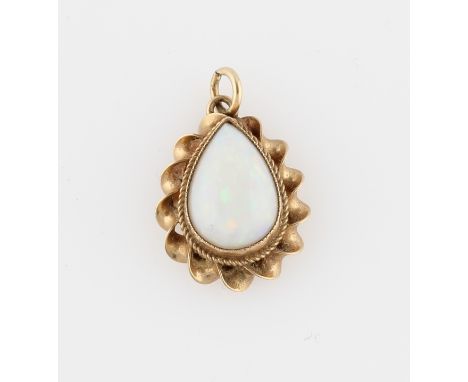 A 9ct yellow gold opal pendant, set with a pear shaped opal cabochon, with rope twist design border, hallmarked Birmingham 19