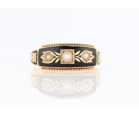 A 15ct yellow gold Victorian split pearl and enamel memorial ring, set with three split pearls to black enamel background wit