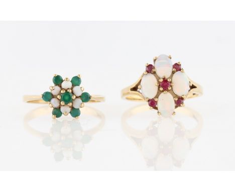 Two hallmarked 9ct yellow gold rings, one set with ruby and opal, the other set with emerald and opal, both in cluster design