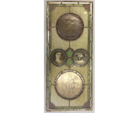 A stained glass lead panel with four classical and portrait scenes. Height 95cm.