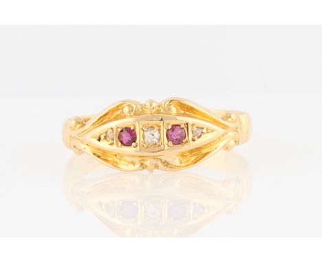 A Victorian 18ct yellow gold ruby and diamond ring, set with two round cut rubies and three round cut diamonds, hallmarked Bi