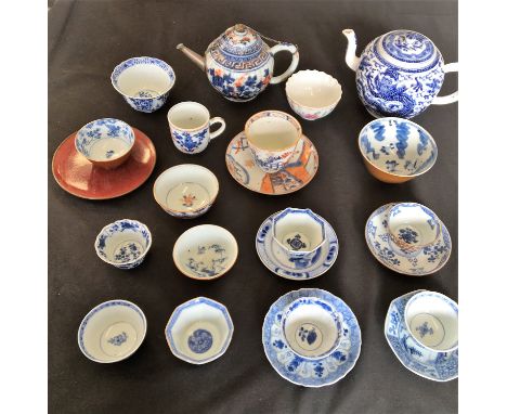 A selection of eighteenth Century Chinese teaware including teapots, cups, saucers and bowls, twenty three items in total.