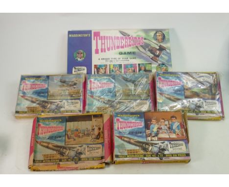 A collection of vintage Waddington Thunderbirds theme puzzles and board games: 