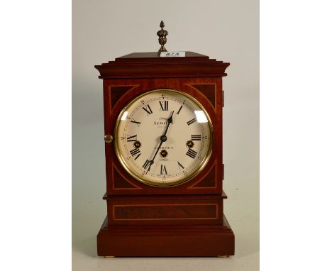 Modern mahogany cased mantle clock: Maker Sewills of Liverpool.  No key, so sold as not working.  Height 31cm not inc. finial