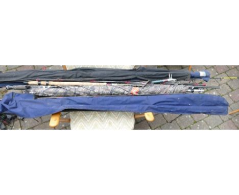 A collection of vintage fishing rods &amp; large camouflage umbrella: 