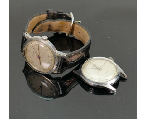 Two Garrard mid century stainless steel gents watches: Watch with strap in manual wind and has ICI presentation dedication to