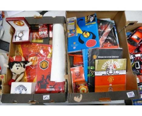 A large collection of Manchester United related items to include: Programmes, Watches, Signed Flags, Offical Supporters item 