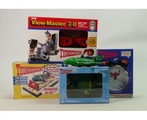 A collection of Thunderbird items to include: Tyco view master, Wesco talking alarm clock, Gerry Anderson sound clip alarm cl