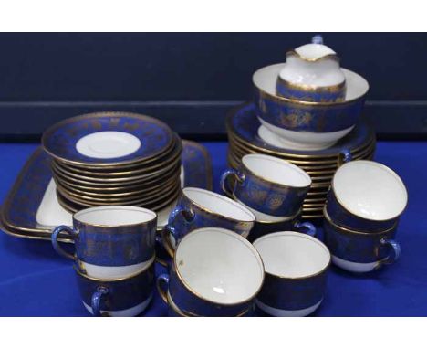 WEDGWOOD 18TH CENTURY STYLE BLUE AND GILT TEA SET
with blue borders and gilt vineous design, with eleven cups, twelve saucers