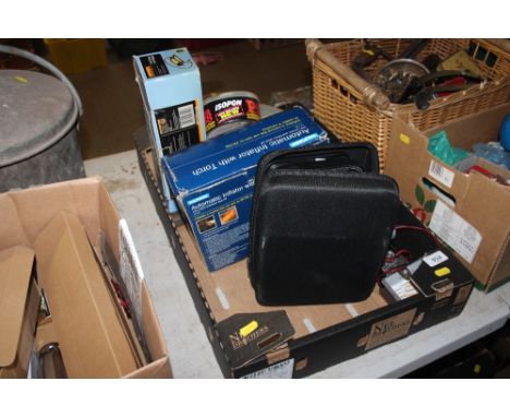 A box containing a various tools; air compressors etc