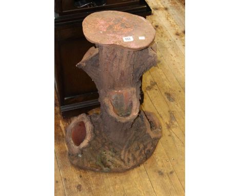 Earthenware planter in the form of a tree stump
