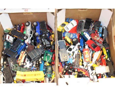 Two boxes of model vehicles