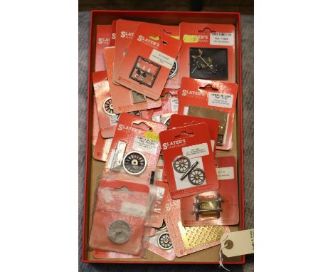 A small quantity of Slater's Plastikard O Gauge railway accessories. Mostly wheels of various scales including 20 spoke 6'8" 