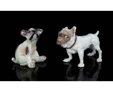 Dahl Jensen For Royal-Copenhagen Two Figurines In The Form Of An English Bulldog And French Bulldog Puppy The first, a seated