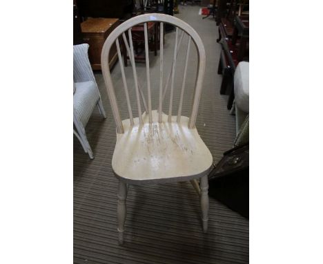A set of six stick back kitchen chairs