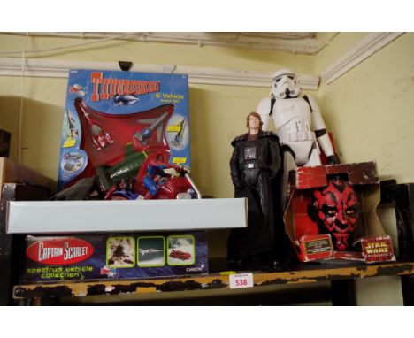 A quantity of TV and film related items, to include: Captain Scarlet; Star Wars; Thunderbirds and Spiderman. (one shelf) 