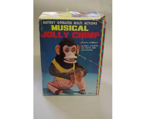 A vintage 'Made in Japan' musical Jolly Chimp,&nbsp;boxed. 