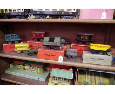 A collection of Hornby Series tinplate O gauge,&nbsp;comprising: Milk Traffic Van, boxed; Gunpowder Van, boxed; Cement Wagon,