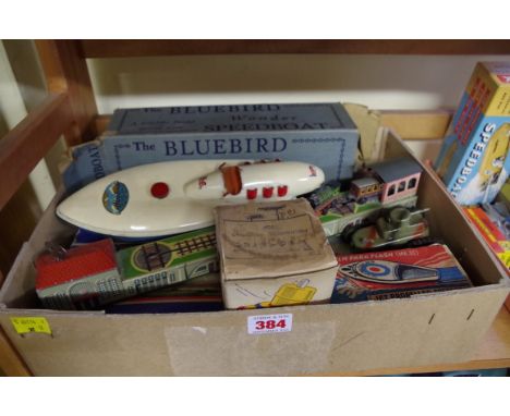 A collection of vintage tinplate toys, to include:&nbsp;a Sutcliffe Model 'The Bluebird Wonder Speedboat', in remains of orig