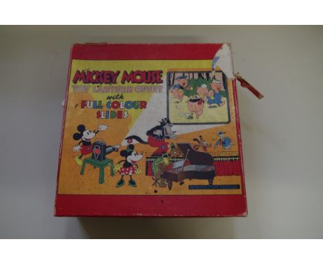 A vintage Mickey Mouse Toy Lantern Outfit,&nbsp;with large selection of full colour slides, in original box.&nbsp; 