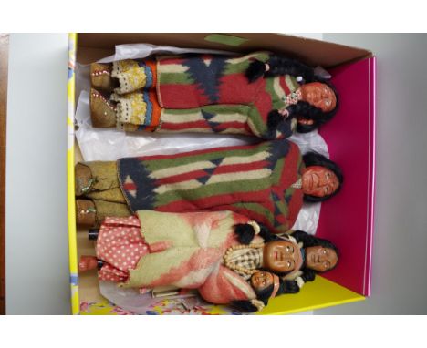 Four vintage native American 'Skookum' dolls. 