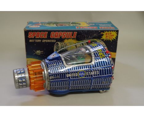 A vintage (circa 1960s) Japanese tinplate battery operated Space Capsule, by S.H. Horikowa Japan, in box. 