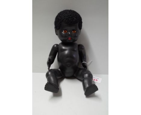 A vintage Rosebud baby doll, approx. 29cm long. 