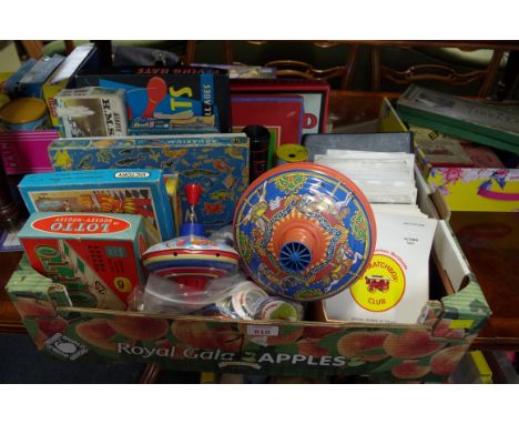 A collection of vintage board games,&nbsp;to include an incomplete 'Aquarium'; spinning tops; badges; together with a quantit