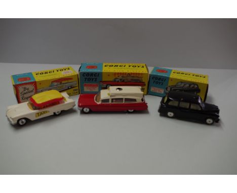 A Corgi Toys Bermuda Taxi, No.430; together with an Austin Taxi, No.418; and a Superior Ambulance on a cadillac chassis, No.4