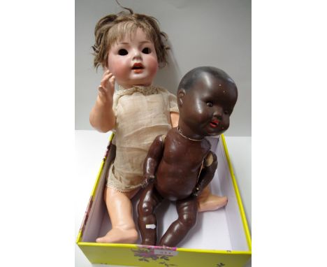 A quantity of vintage dolls and clothing.&nbsp; 