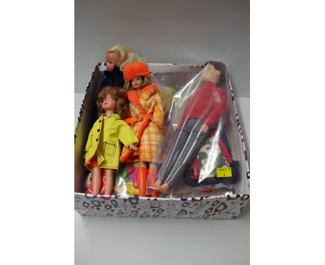A collection of teenage fashion dolls, circa 1960, comprising: a Mattel Barbie, blond Sindy, Paul and Patch; together with a 