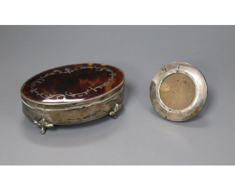 A George V silver and tortoiseshell trinket box and a small photo frame.