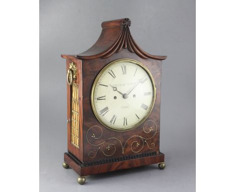 An early 19th century brass inlaid mahogany table clock, William North, York, the pagoda case with brass foliate inlay over r