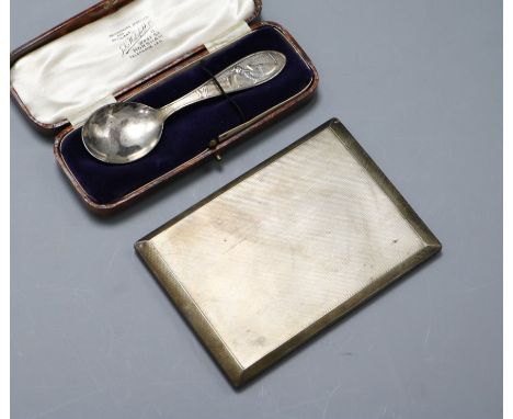 An engine turned silver cigarette case and a cased christening spoon.