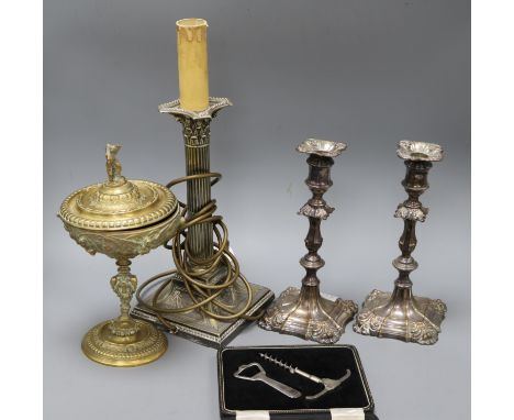 A pair of plated candlesticks, another boxed corkscrew and brass lidded centrepiece