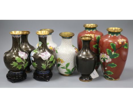 Four pairs of 20th century Japanese cloisonne enamel vases, all of baluster form, comprising a black cloud ground long-necked