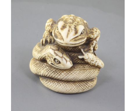 A Japanese ivory netsuke of the 'sansukumi' (snake, frog and snail), 19th century, signed, 4cmProvenance: purchased from Burn