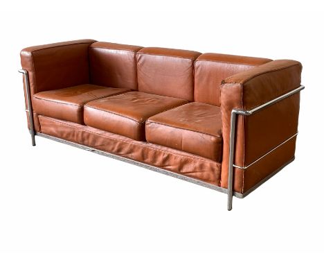 After Le Corbusier - 'LC2' design 20th century three seat sofa with chrome frame and brown leather upholstered arm rests and 