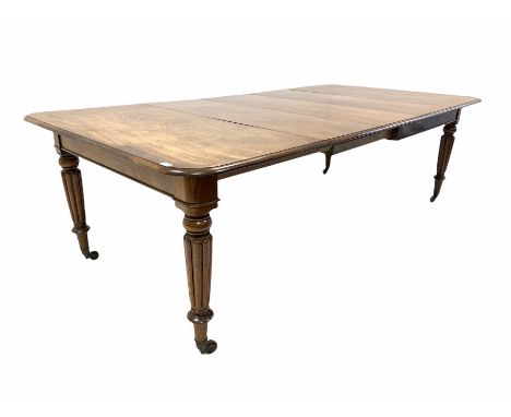 Mid 19th century mahogany extending dining table, the rectangular top with moulded edge and rounded corners, pull out with th