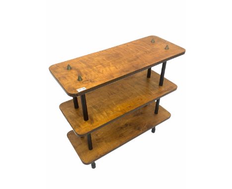 Mid 20th century hardwood three tier open bookcase with rosewood veneered edges, each shelf raised on tubular supports W77cm