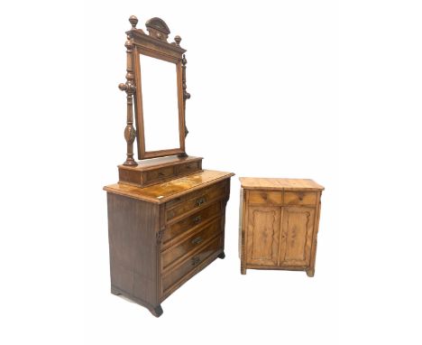 Continental walnut dressing chest, the top fitted with a large swing mirror, candle sconce brackets and two drawers, over a s