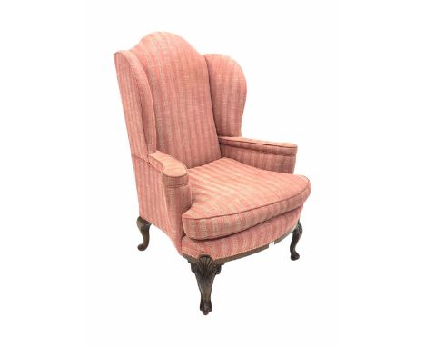 Early 20th century Chippendale style mahogany framed wing back armchair, upholstered in stripped and herringbone pink fabric,