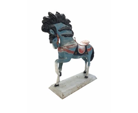 Large painted cast metal model of a horse, raised on a rectangular base 