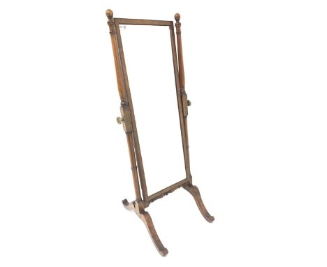 19th century mahogany cheval dressing mirror of small proportions, the swing mirror raised on ring turned supports with four 